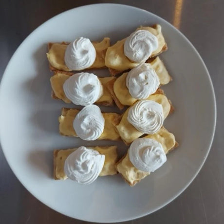 Freeze-Dried Coconut Cream Pie Bites on a plate