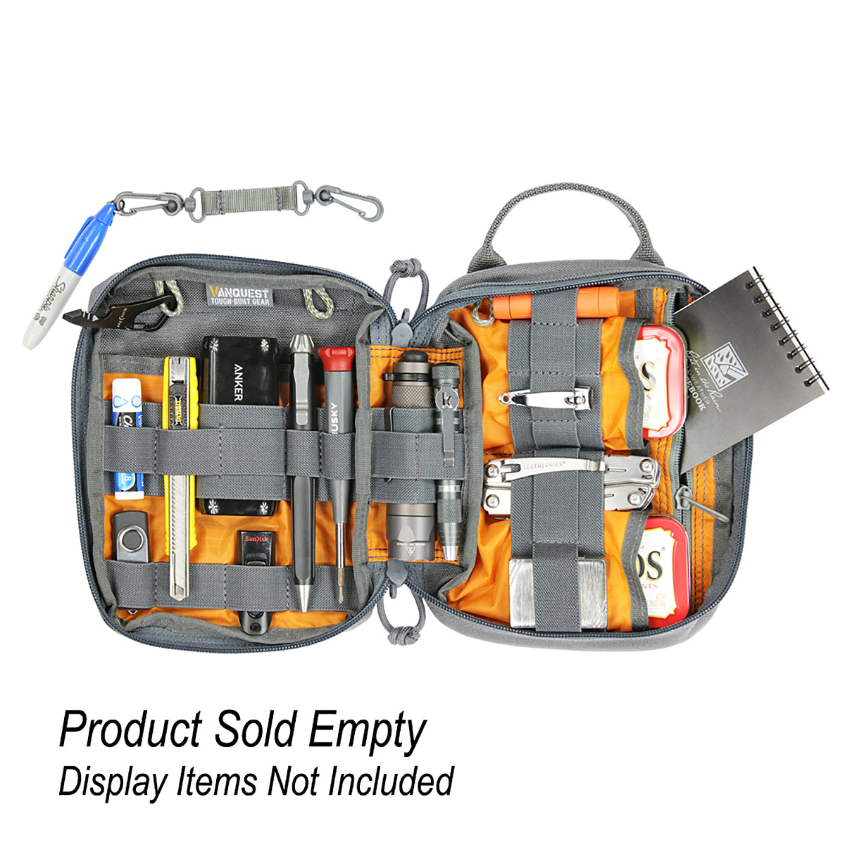 The Edcm huge 2.0 maximizer organizer opened with varied gear like a portable power bank, screwdriver, tactical pen, box cutter, chap stick, usb drives, sharpie marker, mono-scope, flashlight, multi-tool, nail clippers, two packs of altoids and zippered pocket with a black notepad inside. The organizing loops are in grey and the rest of the inside is accented in orange.