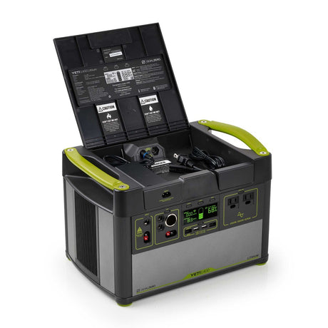 Goal Zero 1400 Lithium portable power station with dual usb and a usb c port. The Power station is a black and green design with a storage compartment for cable management.