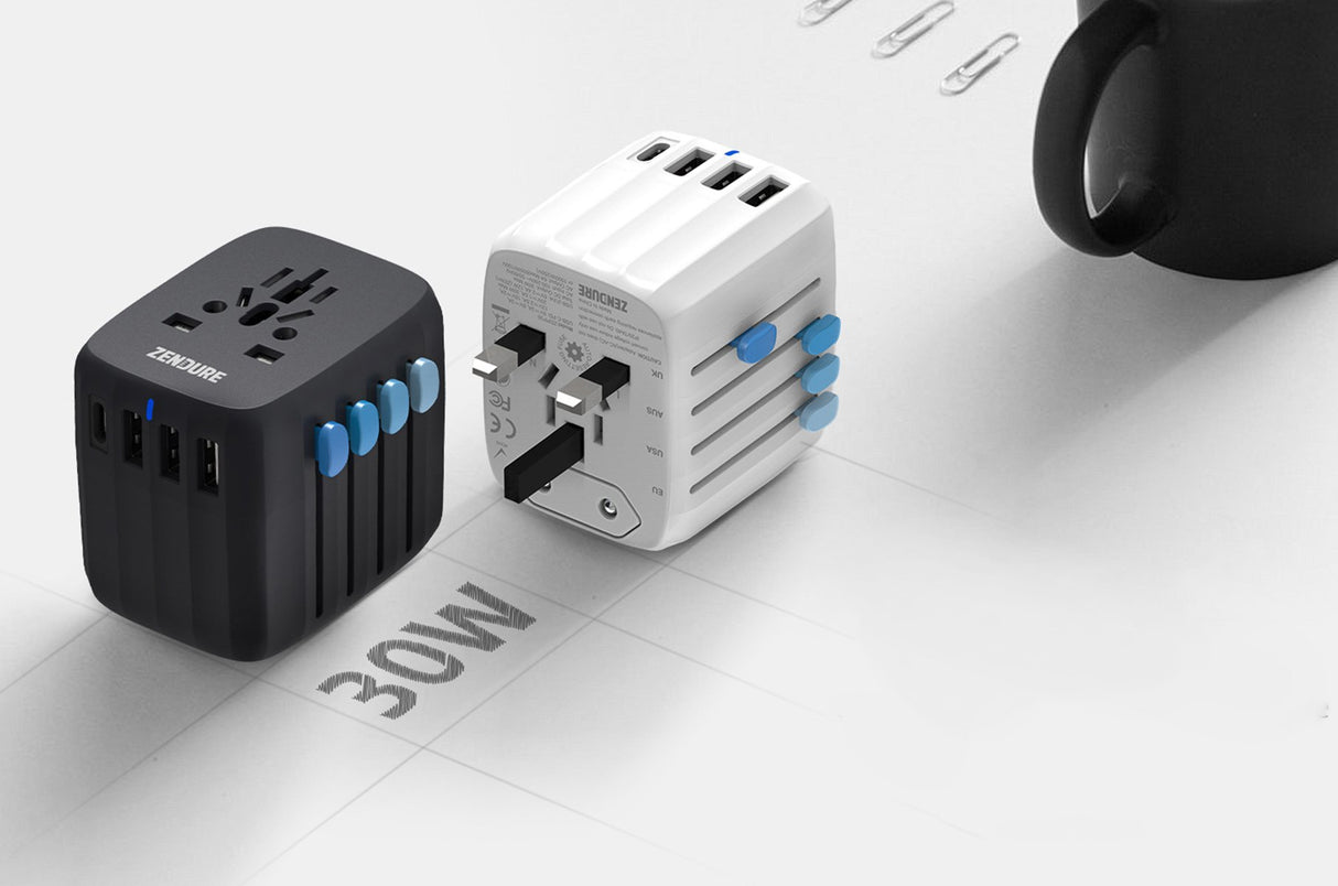 a black Zendure Passport 30W Travel Adapter next to a white Zendure Passport 30W Travel Adapter example