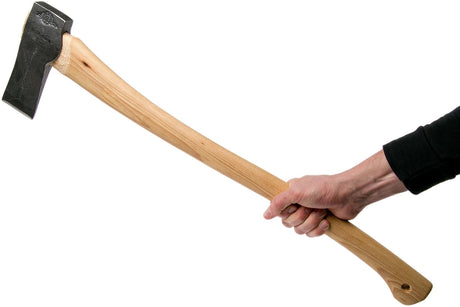 Hulfators Splitting Maul Axe held by a person close to the end of the shaft. The shaft is made of hickory and the axe head is a dark gun metal grey.