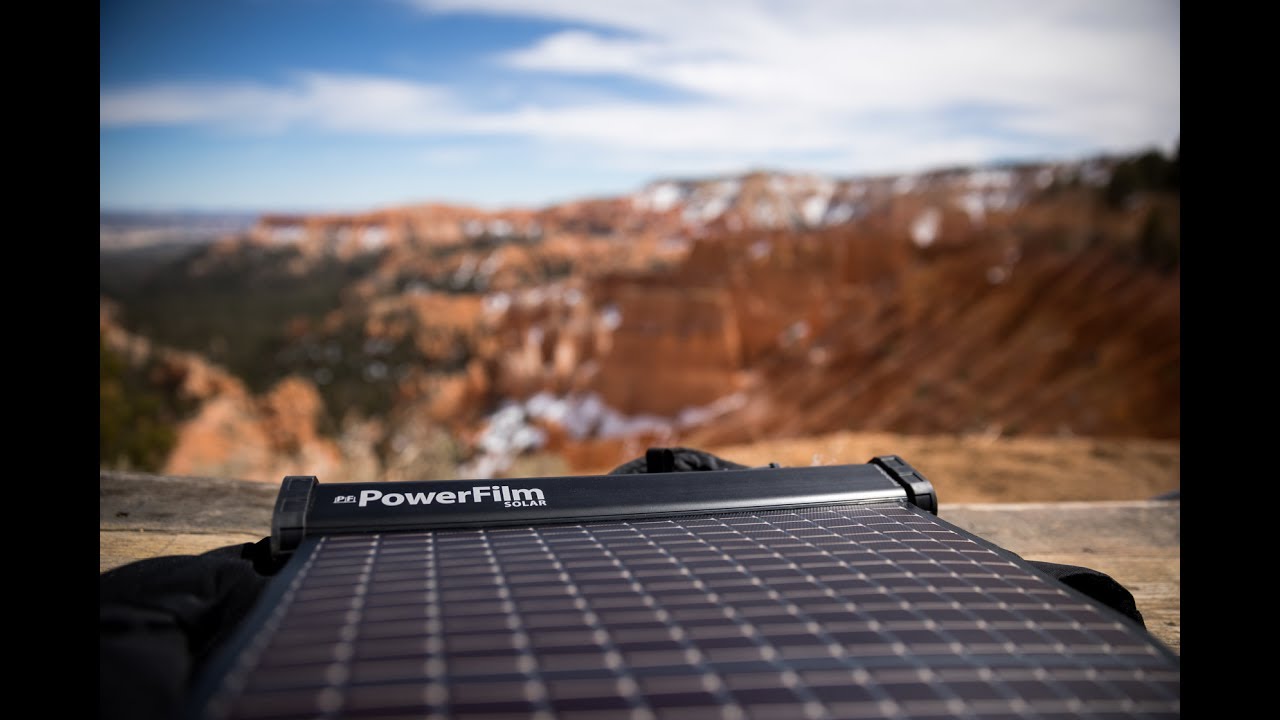 Lightsaver Max Solar Battery Powerfilm rested outside infront of a red canyon.