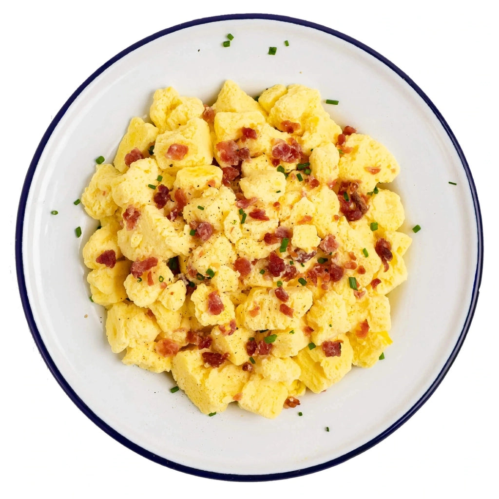 Mountain House Freeze Dried Scrabbled eggs and bacon prepared in a dish. 