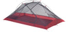 The bug meshing of the MSR Carbon Reflex 2 person tent. The bottom base of the tent is a deep red and the mesh is black.