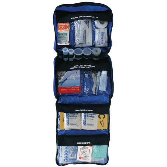 Backcountry Adventure Medical Kit with 4 compartments of medical supplies in blue with black covers labeled with 'wound care' 'first aid manual' 'fracture/sprain' and 'bleeding/cpr'.