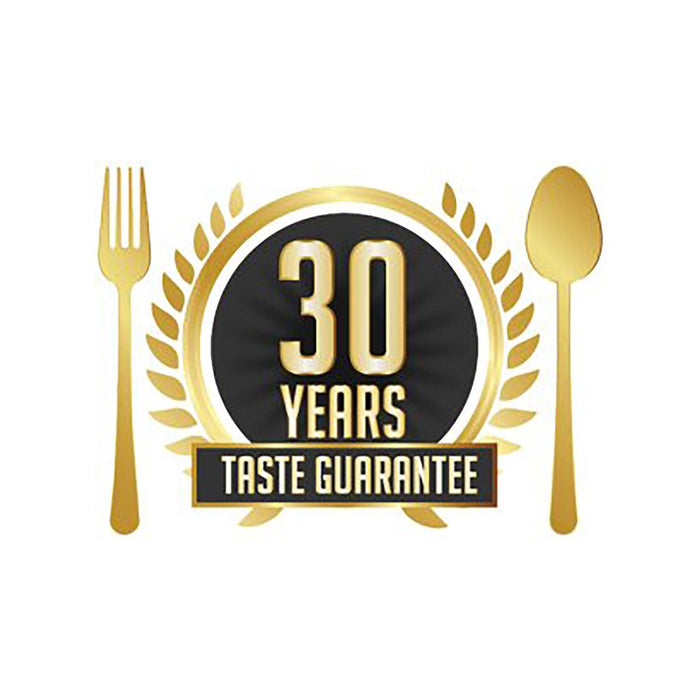 '30 years Taste Guarantee' Stamp of approval. A golden fork and spoon are placed beside the ribbon of text.