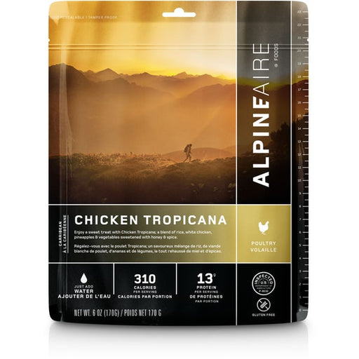 Alpineaire Chicken Tropicana product package, with a hiker trekking across a hillside during a sunset.
