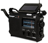 Kaito KA500 voyager radio in black with am, fm, sw, and NOA weather alert capable radio. The solar panel is point up to charge the device and the hand crank is shown.