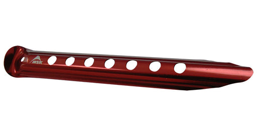 A deep red coloured MSR Blizzard tent stake on a white background.