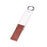 Fine grit DMT Mini-Sharp Portable Diamond Sharpener in red dot pattern.