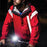 Man cyclist biking at night with a bike lamp and red jacket with taped tenacious reflective gear aid tape for extra night time visibility.