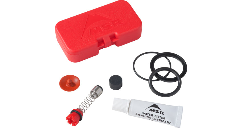 MSR Guardian System Maintenance Kit in Red with the Instructions, Pressure Relief Assembly, Relief Valve O-ring, Piston O-ring, End Nut O-ring, Piston Cup Seal, Umbrella Valve, Clean Side Cover Seal, MSR Food-Grade Silicone Lubricant.