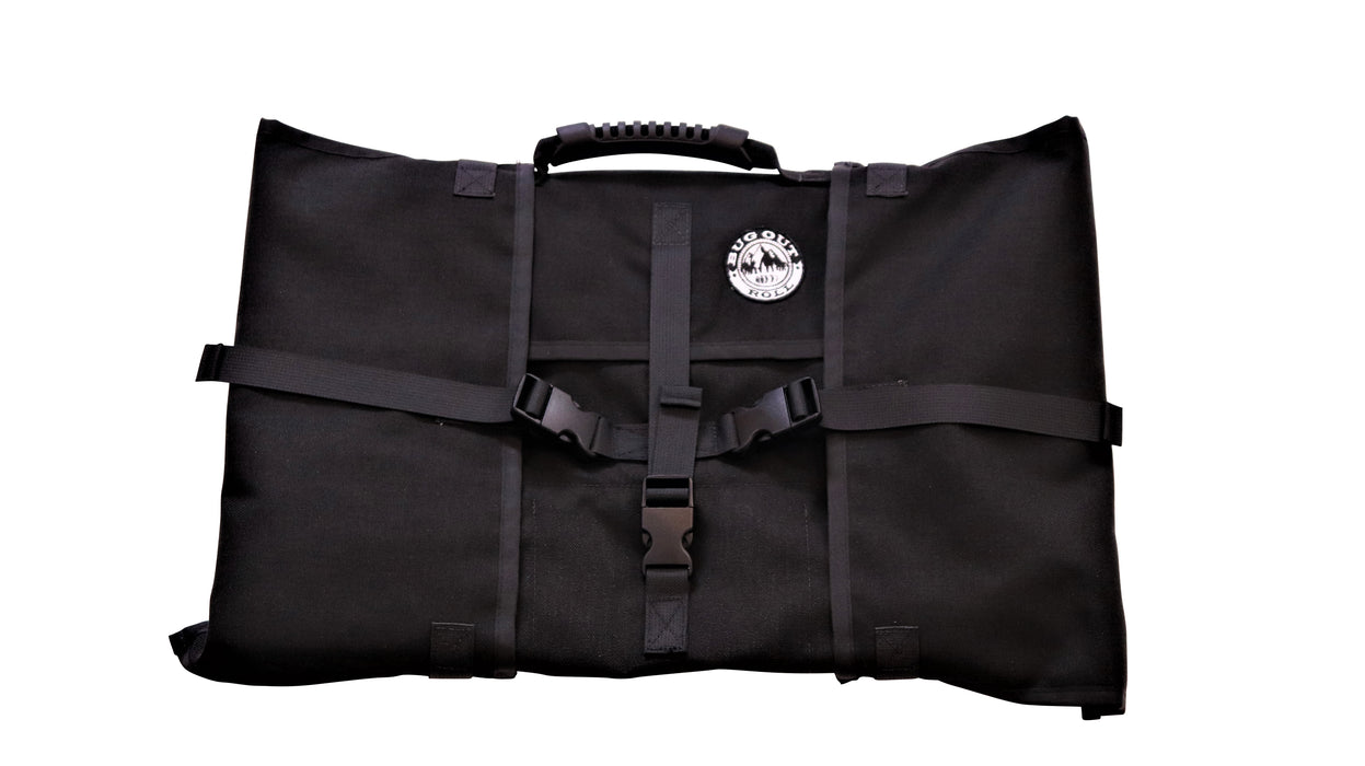 The Tactical Black Bug Out Roll with black hard plastic clips locked, the rubberized handle grip on top and the 'BugOut Roll' Logo patched on the front of the bag.