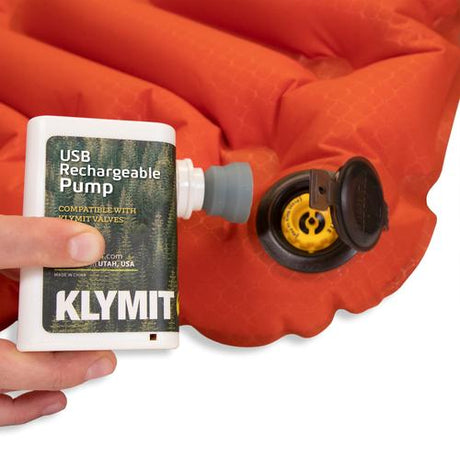 KLYMIT USB rechargeable pump use example on orange sleeping pad