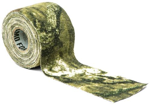 A roll of Mossy Oak designed Camouflage on a white background.