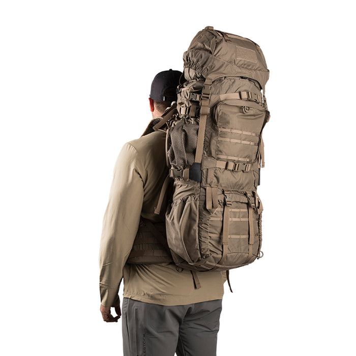 Man carrying Eberlestock Destroyer Dry Earth color Backpack