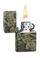 Open Camo design Zippo Lighter with a lit flame