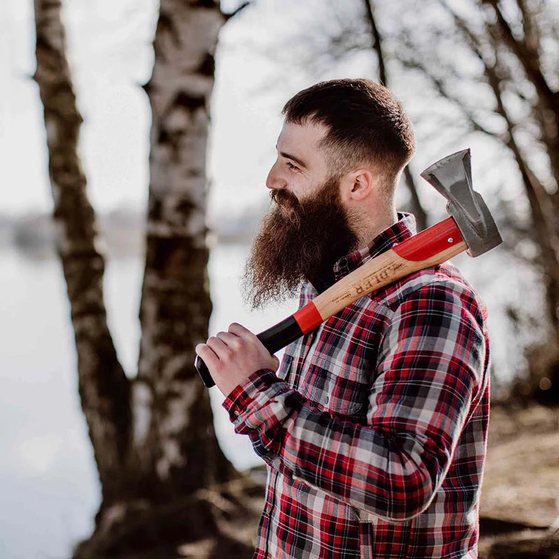 Adler Short Premium Splitting hatchet on a mans shoulder wearing plaided long sleeve shirt