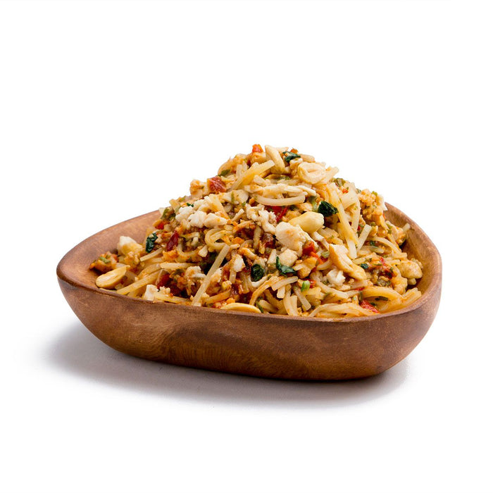 Triangular Wooden Bowl of the Backpackers Pantry Pad Thai with Chicken prepared bowl.