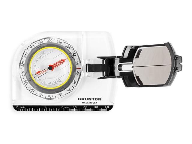 Top down view of the Brunton TruArc 7 Mirrored Sighting Compass, in Black and White with the reflective mirror, tool-less declination and inclinometer for measuring tree heights.