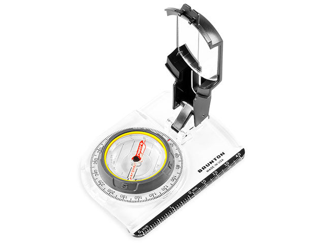 Side view of the Black and White coloured Brunton TruArc 7 Mirrored Sighting Compass with the dial showing, degree measurements, side ruler for measuring map distances, and inclinometer all showing.