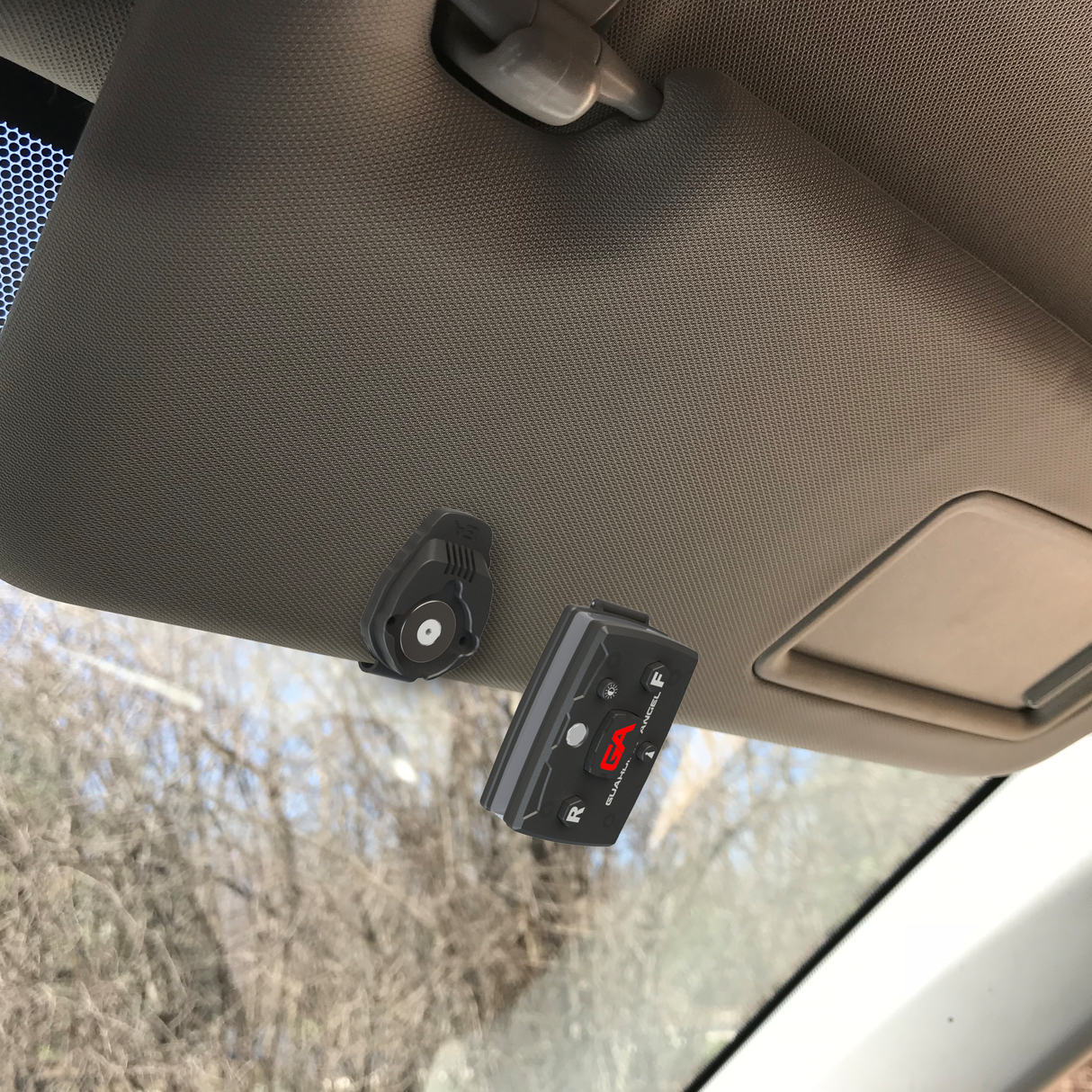 Guardian Angel Emergency light system mounted on a car sun visor.