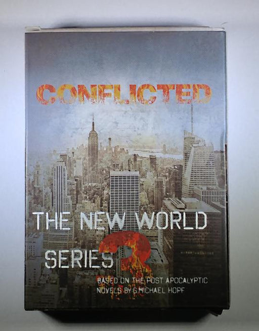 The front of the Conflicted Deck 3 - The New World Series card deck box. The title 'Conflicted' is howin in an orange firey looking text and the description 'Based on the post apocalyptic novels by G. Michael Hopf.