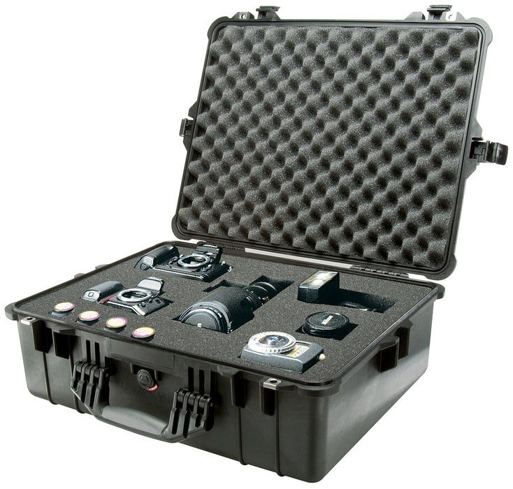 Two DSLR cameras with changeable lens's and extra film organized in the foam interior of the Pelican 1600 Protector Case.